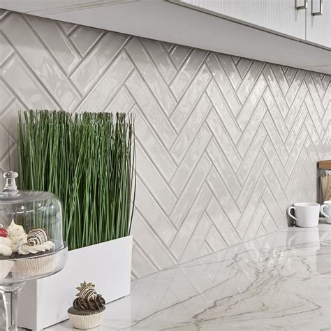 Arizona. tile - Image: Castle Brick White Wall Tile From Arizona Tile. Brick: Brick-look tile has the texture and appearance of real brick, but it’s much easier to install and care for than true brick. Brick-look porcelain tile is a great option for fireplace surrounds, backsplashes and accent walls. Wood: Faux wood tile is hugely popular since it’s easy ...